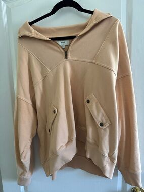 aerie Cozy Half-Zip Hoodie in light peach color